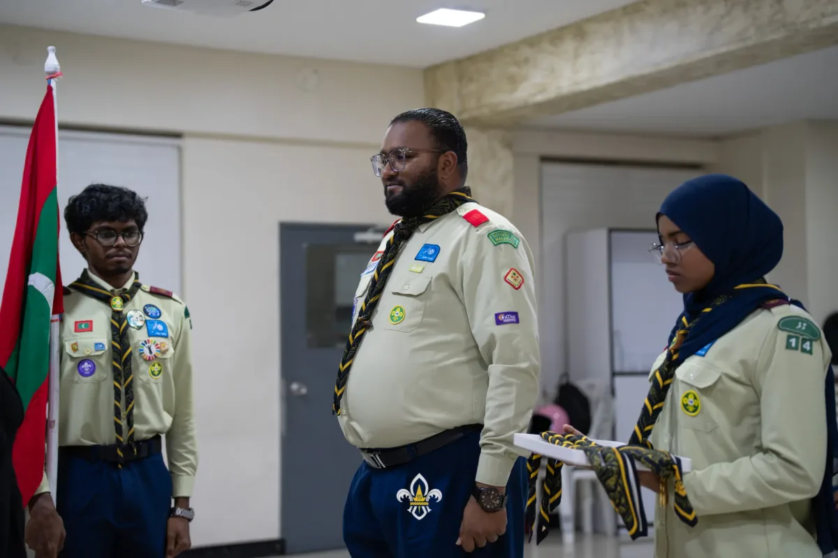 The Rover Advisor and fellow Rovers prepare for the presentation of scarves.