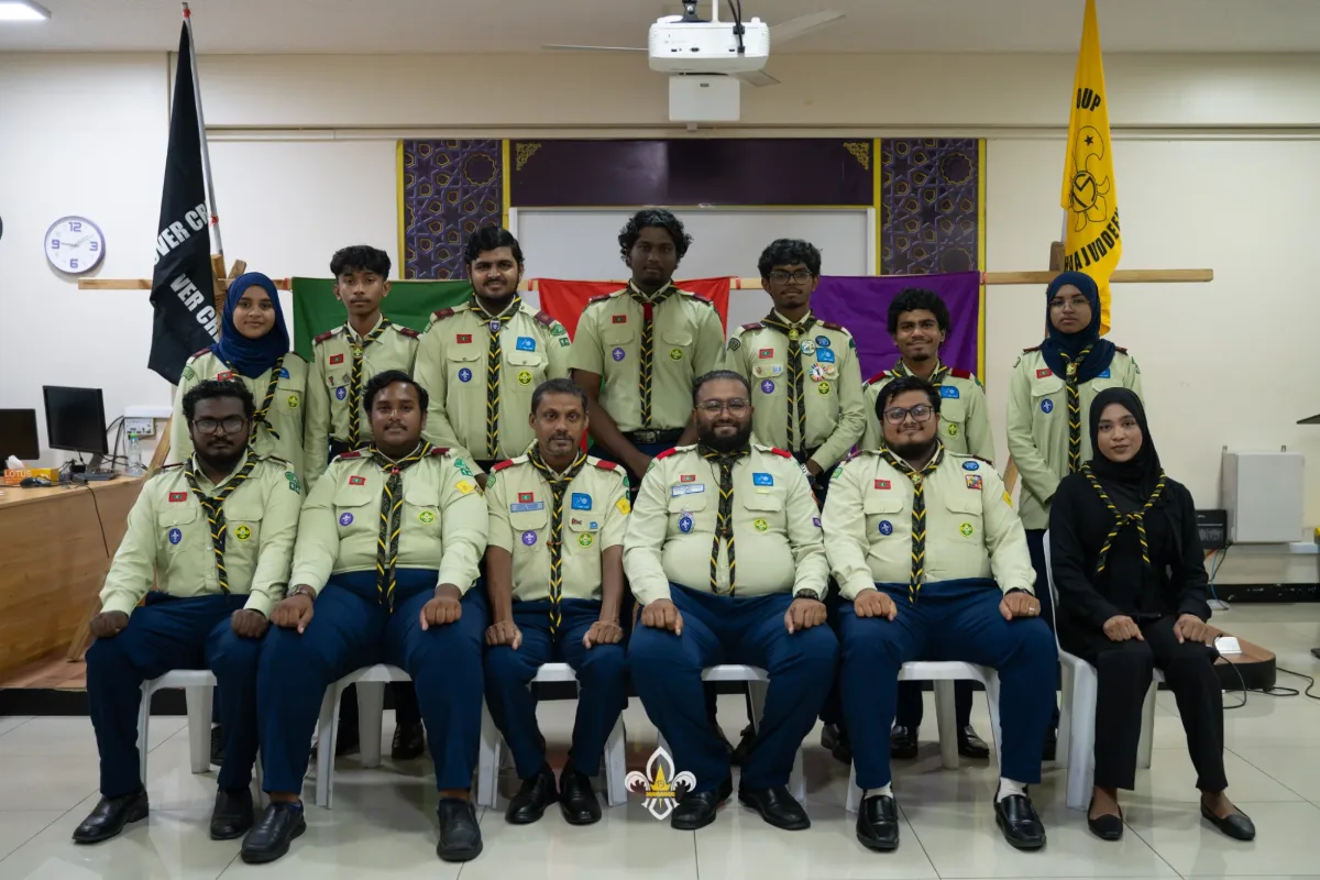 Rovers and leaders pose in two rows for a group photograph after the ceremony.