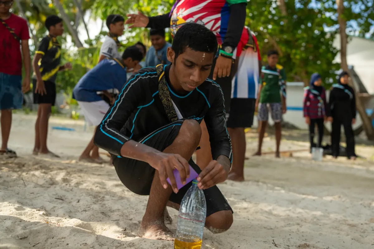 Scouts enjoying water activities at the beach in V. Felidhoo