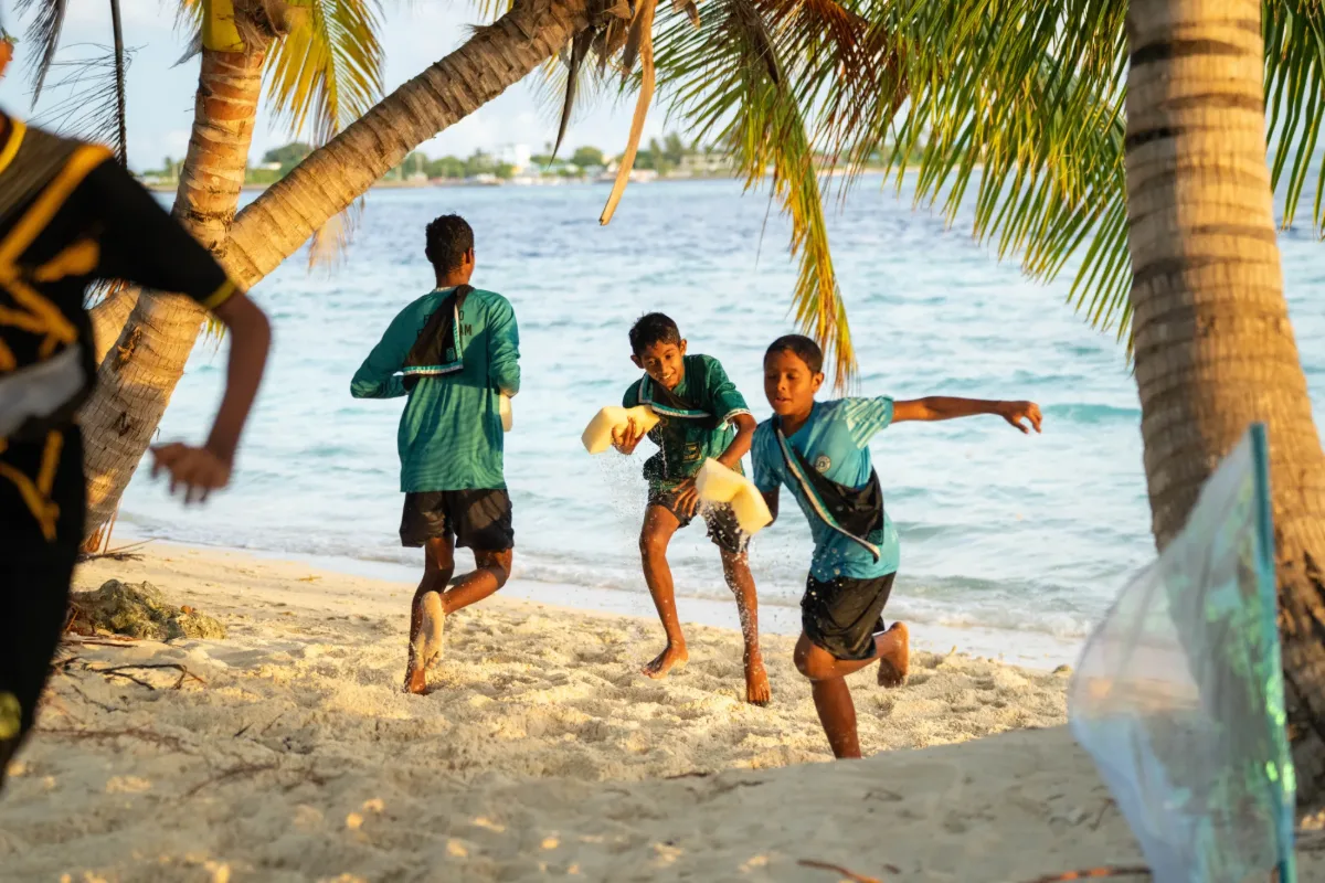 Scouts enjoying water activities at the beach in V. Felidhoo