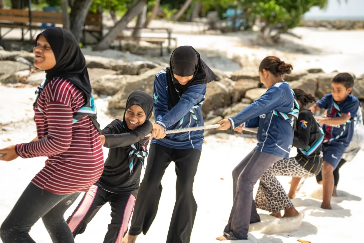 Scouts enjoying water activities at the beach in V. Felidhoo